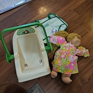 Cabbage Patch Kids Cream and Green Doll Carrier with Floral Doll